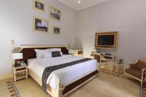 Cama o camas de una habitación en Java Villas Boutique Hotel & Resto