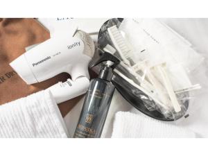 a hair dryer and a razor and some towels at Kamon Hotel Namba - Vacation STAY 37029v in Osaka