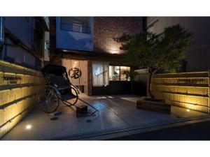 a bike parked on the side of a building at Kamon Hotel Namba - Vacation STAY 37029v in Osaka