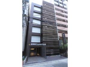 a building with a sign on the side of it at Dotonbori Crystal Hotel - Vacation STAY 77453v in Osaka