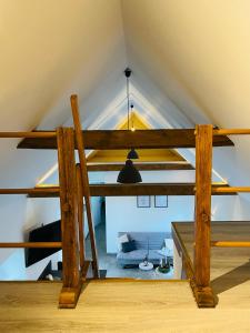 a chandelier hanging from the roof of a room at Ferienwohnung Lindenglück in Uedem
