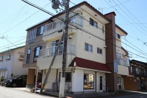 a building on the corner of a street at Corp Temma - Vacation STAY 08268v in Takayama