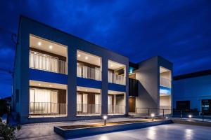 an exterior view of a building at night at Hotel Dios - Vacation STAY 31239v in Awaji