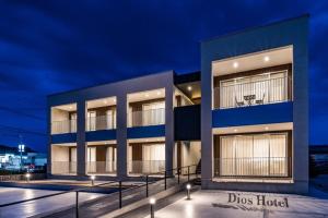 a large building with a basketball hoop on top of it at Hotel Dios - Vacation STAY 31424v in Awaji