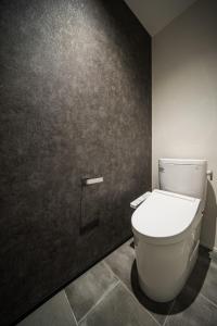 a bathroom with a white toilet in a room at Hotel Dios - Vacation STAY 31424v in Awaji +19 photos