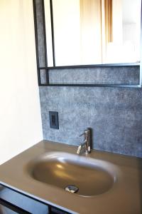 a bathroom sink with a mirror above it at Hotel Dios - Vacation STAY 40406v in Awaji +22 photos