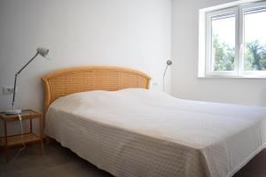 Postel nebo postele na pokoji v ubytování Luxury Apartments Adria + 33 fotografií