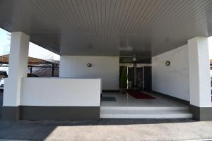 a building with a white table in the middle at Hotel Mare - Vacation STAY 58144v in Kure