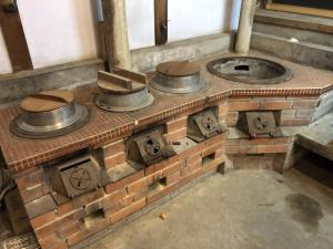 a brick oven with three pans on top of it at Setouchi base - Vacation STAY 48143v in Mitoyo