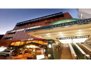 a large building with stairs in front of it at Central Hotel - Vacation STAY 99769v in Kusugaurachō +9 photos