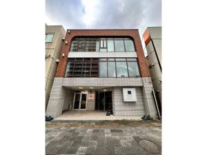 a building with the front entrance of a building at Monarch Hotel - Vacation STAY 43004v in Otaru