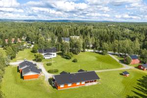 an aerial view of a house with a large yard at LODGE Hostel Kuusamo in Kuusamo