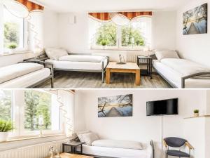 a living room with white furniture and windows at Holiday Home Bailey by Interhome in Laupheim