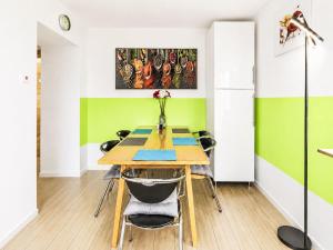 a dining room with a table and chairs at Holiday Home Bailey by Interhome in Laupheim +32 photos