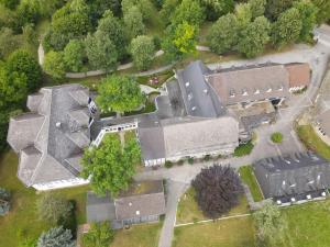 an overhead view of a house with a roof at Hotel Gut Funkenhof in Sundern