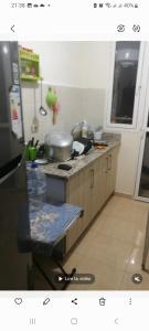 a kitchen with a counter top with a stove top oven at سيدي رحال الشاطئ in Sidi Rahal