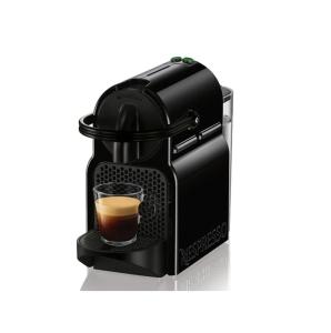a black coffee maker with a glass of coffee at Volání divočiny in Vrchlabí