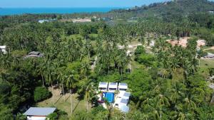 an aerial view of a resort with palm trees at Samui Land Haven in Taling Ngam Beach