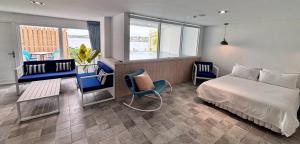 a hotel room with a bed and a balcony at 南灣飯店 Kenting Nanwan Hotel in Nanwan