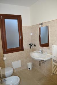 Koupelna v ubytování I Giganti + 30 fotografií