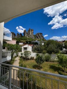 a view of a mountain from a balcony at Skyloft Meteora 1 in Kalabaka