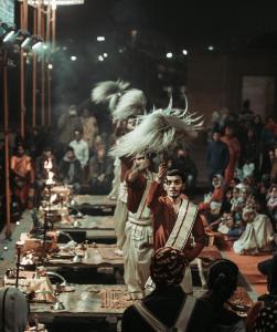 a group of people on a runway in front of a crowd at Sandhya Guest House Varanasi Near Ganga River in Varanasi