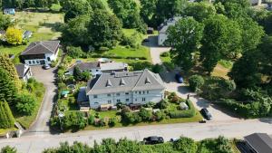 an aerial view of a house with a driveway at Ferienwohnung Glück auf in Gornsdorf