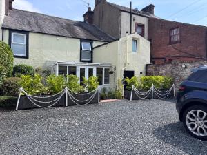 a house with nets in front of it at No 3 in Penrith