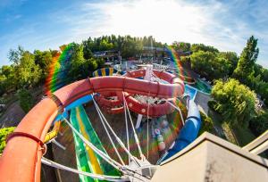 an amusement park with a roller coaster at Session Hotel Ráckeve in Ráckeve
