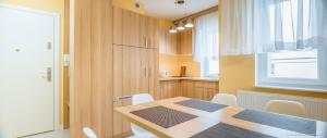 Posteľ alebo postele v izbe v ubytovaní Apartament Posejdon Kołobrzeg