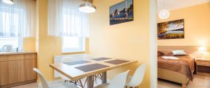 Posteľ alebo postele v izbe v ubytovaní Apartament Posejdon Kołobrzeg