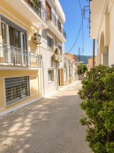 an empty street in an apartment building at Vathy Central Residence in Samos