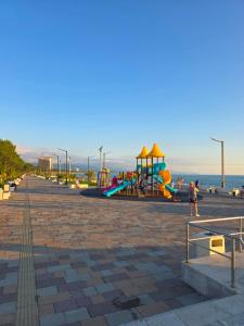 a playground with a slide at ,,KaKalo'' Apartments in Kobuleti