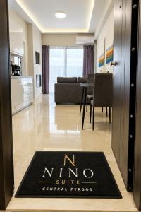 a living room with a nino suite central vancouver apartment at Nino Suite, Central Pyrgos in Pyrgos