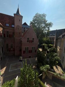 an aerial view of a building with a tower at Zwols stadshuis in Zwolle