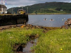two people in kayaks in a body of water at Puffin - Kerrera in Lerags +2 photos