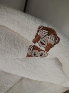a drawing of a person on a towel at Alvesta Guest House in Nafplio +19 photos