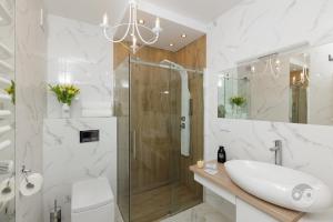 Kúpeľňa v ubytovaní Apartment Royal II + 18 fotografií