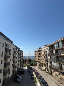 a view of an apartment complex from a balcony at Dunav View Residence - River View Free Parking in Belgrade