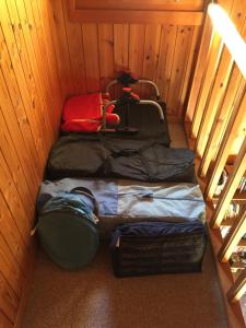 Voodi või voodid majutusasutuse Chalet Valdonga toas