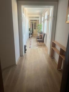 an empty hallway with a hallwayngth at Tabacco in Obrenovac
