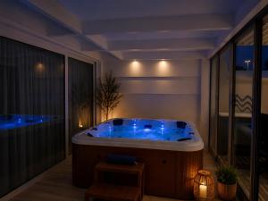 a jacuzzi tub in the middle of a room at Villa Dru in Roquetas de Mar +51 photos