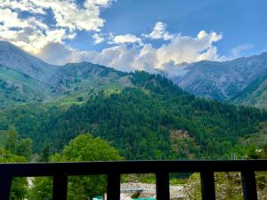a view of the mountains from a balcony at Kove Hotel & Resort in Naran +11 photos