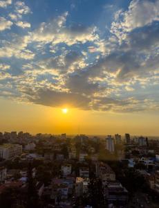a view of a city at sunset at Vip Executive Suites Maputo in Maputo