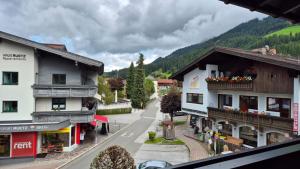 a view of a street in a town with buildings at Appartement HARRIE by Miha in Westendorf