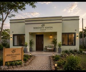 a building with a sign in front of it at Serenity Haven in Chongwe