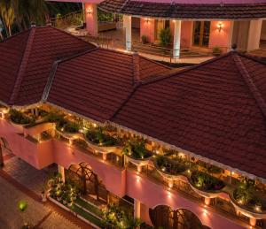 an overhead view of a building with lights at Rose Villa Kovalam in Kovalam