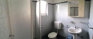 Koupelna v ubytování Apartments Bodi + 37 fotografií