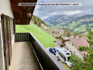 a truck parked on the balcony of a house at Chalet Panorama in Adelboden