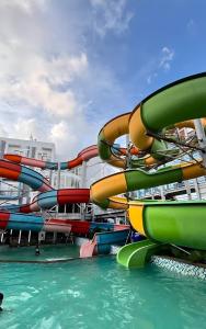 a group of water slides on a cruise ship at Pentapolis Apartment Balikpapan Superblock LT4 in Balikpapan